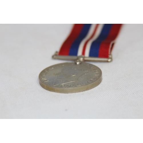 912 - WWII MEDAL UNSIGNED IN BOX NAMED CORT