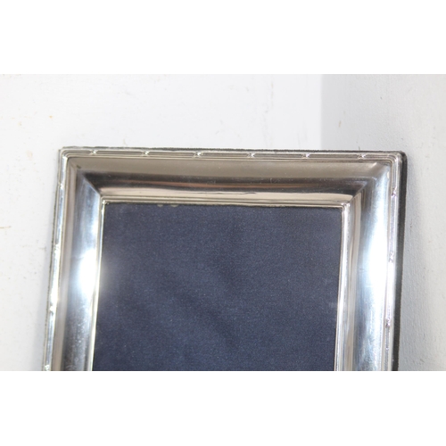 1162 - HALLMARKED SILVER PICTURE FRAME
22 X 18CM