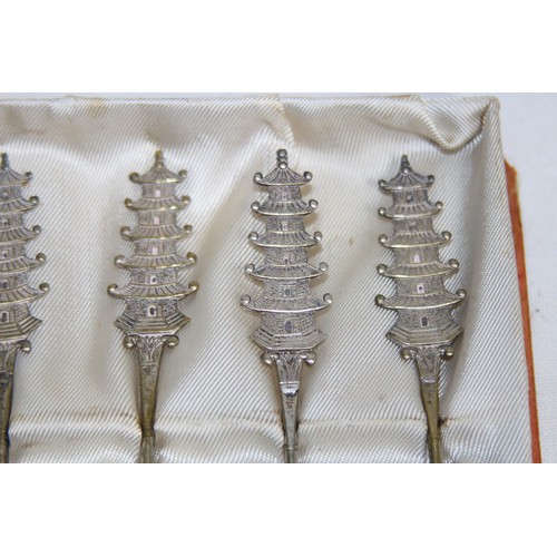 1164 - SET OF ORIENTAL SILVER PLATE SPOONS IN BOX