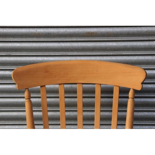 105 - NATURAL PINE FARMERS FIRESIDE CHAIR 
67 X 52 X 113CM