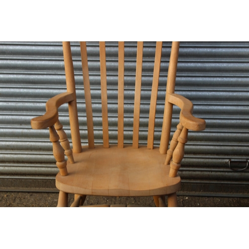 105 - NATURAL PINE FARMERS FIRESIDE CHAIR 
67 X 52 X 113CM