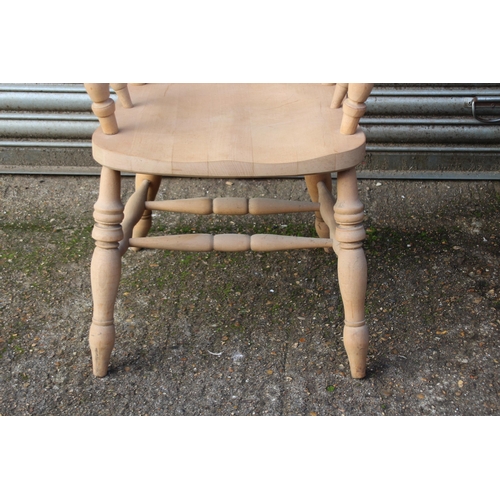 105 - NATURAL PINE FARMERS FIRESIDE CHAIR 
67 X 52 X 113CM