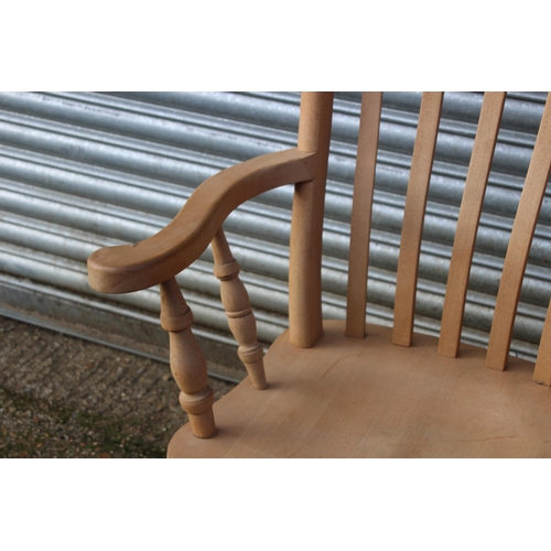 105 - NATURAL PINE FARMERS FIRESIDE CHAIR 
67 X 52 X 113CM