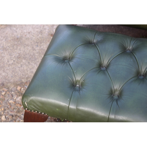 108 - GREEN LEATHER  CHESTERFIELD WINGBACK ARMCHAIR AND FOOTSTOOL
93 X 80 X 106CM