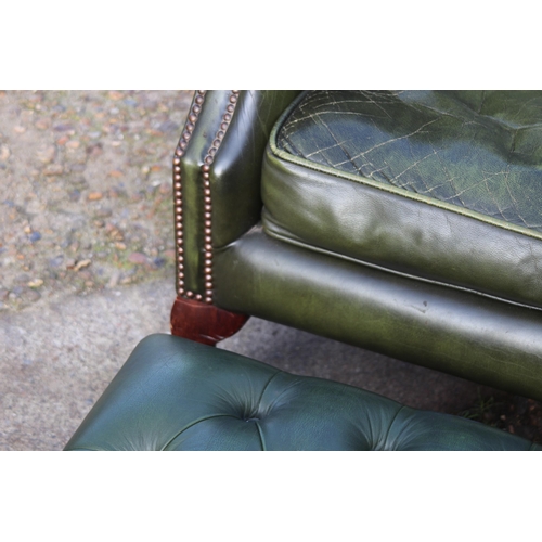 108 - GREEN LEATHER  CHESTERFIELD WINGBACK ARMCHAIR AND FOOTSTOOL
93 X 80 X 106CM