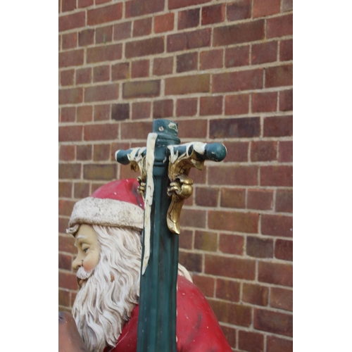 143 - LIFE SIZED SANTA WITH LIGHT UP PILLAR AND REINDEER 
170CM