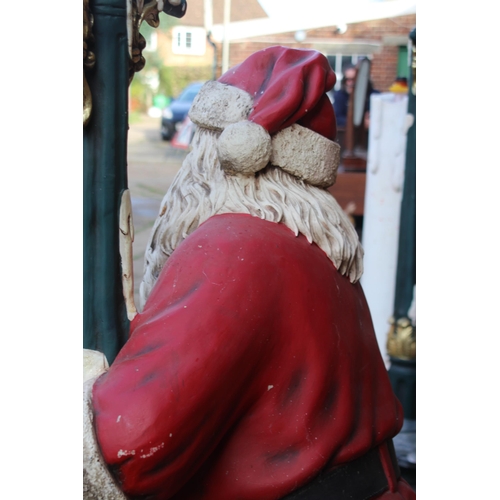 143 - LIFE SIZED SANTA WITH LIGHT UP PILLAR AND REINDEER 
170CM