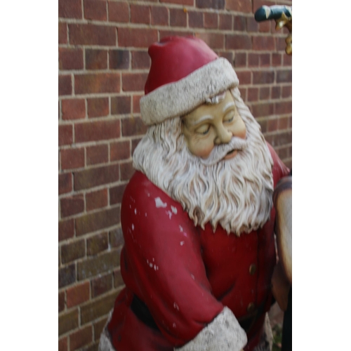 143 - LIFE SIZED SANTA WITH LIGHT UP PILLAR AND REINDEER 
170CM