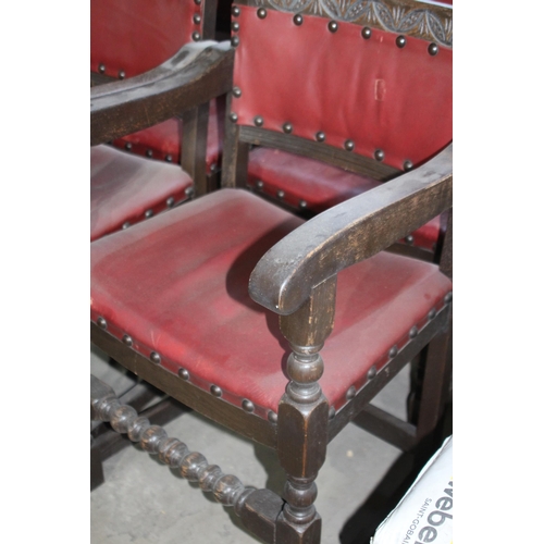 121 - SET OF FOUR RED LEATHER CHAIRS - 2 ARE CARVERS 
54 X 50 X 85CM