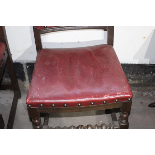 121 - SET OF FOUR RED LEATHER CHAIRS - 2 ARE CARVERS 
54 X 50 X 85CM