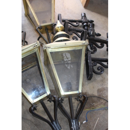 249 - FOUR BRASS LANTERN LAMPS AND BRACKETS 
35 X 93CM