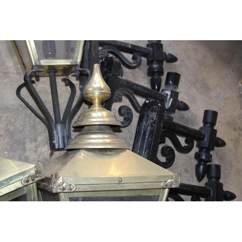 249 - FOUR BRASS LANTERN LAMPS AND BRACKETS 
35 X 93CM