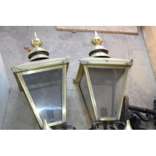 249 - FOUR BRASS LANTERN LAMPS AND BRACKETS 
35 X 93CM