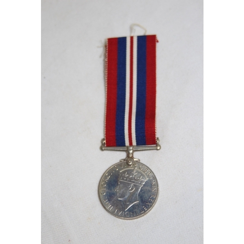 912 - WWII MEDAL UNSIGNED IN BOX NAMED CORT