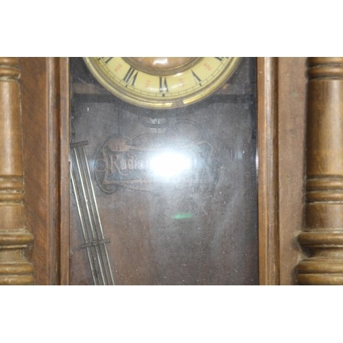 691 - ANTIQUE RADIUM GONG WALL CLOCK
78 X 36 X 28CM