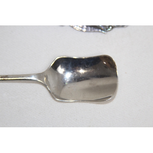 1168 - ENGLISH SILVER CADDY SPOON AND AN ART NOUVEAU DANISH CADDY SPOON