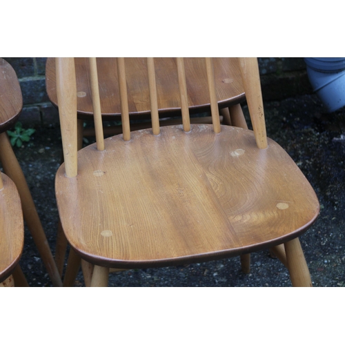 33 - BLONDE ERCOL SET OF FOUR GOLDSMITH CHAIRS 
43 X 42 X 98CM