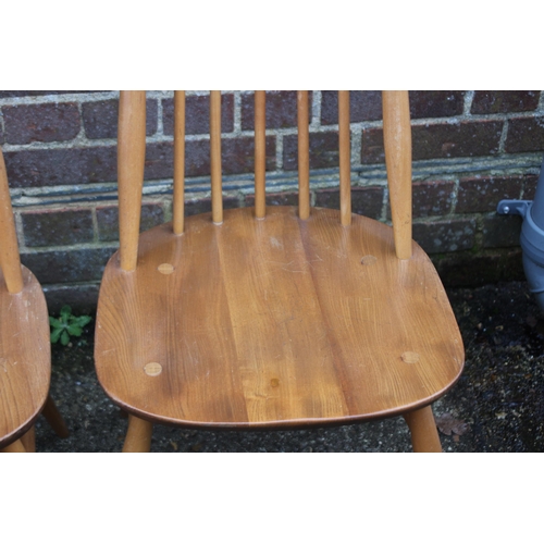 33 - BLONDE ERCOL SET OF FOUR GOLDSMITH CHAIRS 
43 X 42 X 98CM