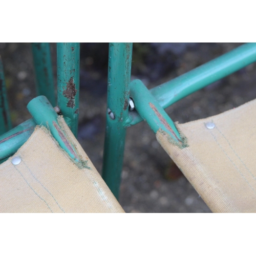 7 - SET OF FOUR VINTAGE RETRO REMPLOY MILITARY GREEN TUBULAR STEEL AND CANVAS STACKABLE CHAIRS
40 X 47 X... 