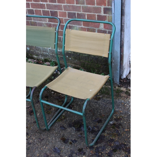 7 - SET OF FOUR VINTAGE RETRO REMPLOY MILITARY GREEN TUBULAR STEEL AND CANVAS STACKABLE CHAIRS
40 X 47 X... 