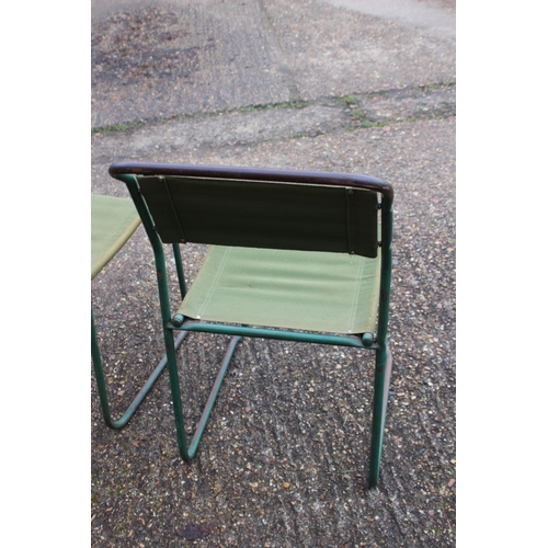 8 - SET OF FOUR VINTAGE RETRO REMPLOY MILITARY GREEN TUBULAR STEEL AND CANVAS STACKABLE CHAIRS
40 X 47 X... 