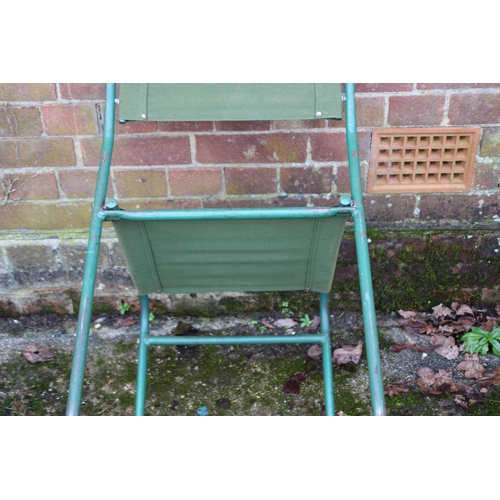 8 - SET OF FOUR VINTAGE RETRO REMPLOY MILITARY GREEN TUBULAR STEEL AND CANVAS STACKABLE CHAIRS
40 X 47 X... 