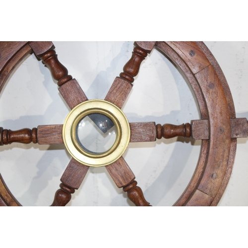 598 - REPRODUCTION SHIP WHEEL AND BAROMETER
64CM