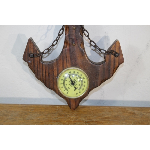 598 - REPRODUCTION SHIP WHEEL AND BAROMETER
64CM