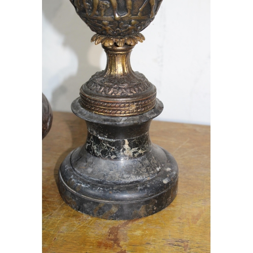 605 - CAST CARVED CUP ON MARBLE BASE AND VINTAGE METAL HANGING PLANTER
34CM