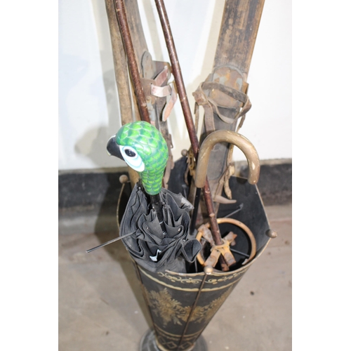 609 - VINTAGE UMBRELLA STAND AND INTERESTING CONTENTS 
55CM