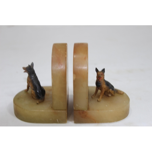 897 - PAIR OF ART DECO COLD PAINTED ALSATIAN DOG BOOK ENDS
10 X 8CM