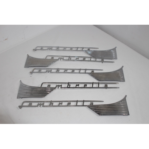 927 - QUANTITY OF LAMBRETTA CHROME INSIGNIA