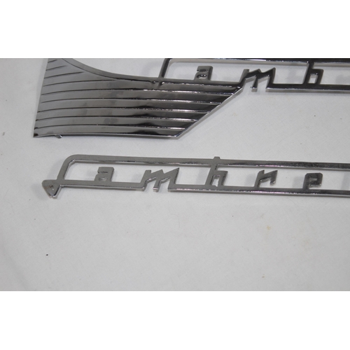 927 - QUANTITY OF LAMBRETTA CHROME INSIGNIA