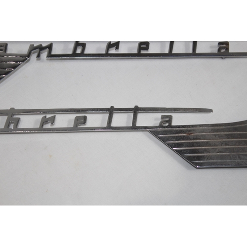 927 - QUANTITY OF LAMBRETTA CHROME INSIGNIA