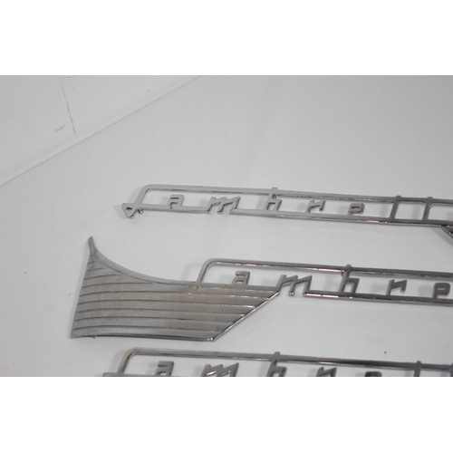 927 - QUANTITY OF LAMBRETTA CHROME INSIGNIA