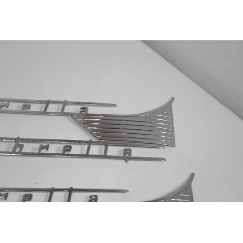 927 - QUANTITY OF LAMBRETTA CHROME INSIGNIA