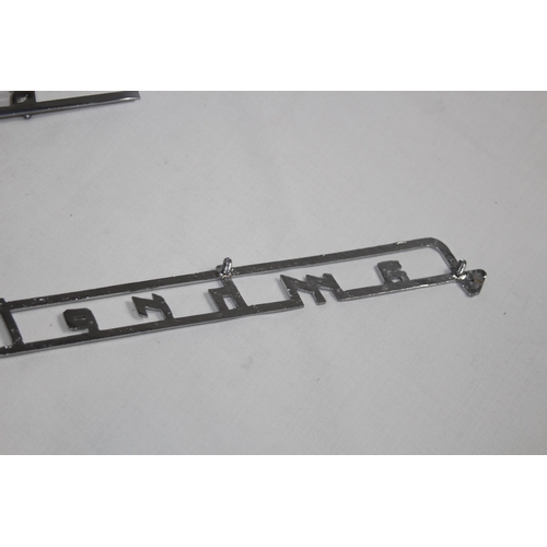 927 - QUANTITY OF LAMBRETTA CHROME INSIGNIA