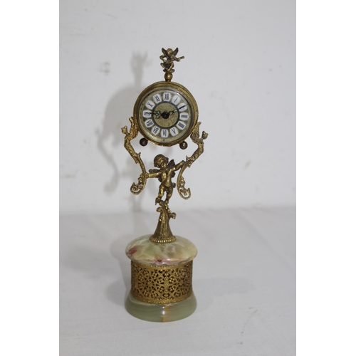 550 - ANTIQUE GILT BRONZE AND ONYX BOUDOIR CLOCK