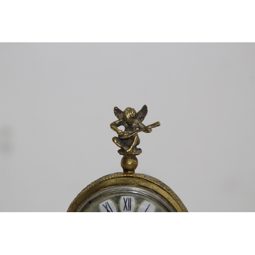 550 - ANTIQUE GILT BRONZE AND ONYX BOUDOIR CLOCK