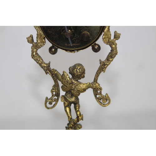 550 - ANTIQUE GILT BRONZE AND ONYX BOUDOIR CLOCK