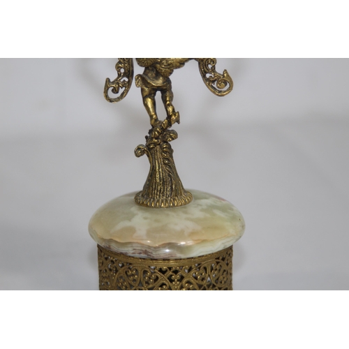 550 - ANTIQUE GILT BRONZE AND ONYX BOUDOIR CLOCK