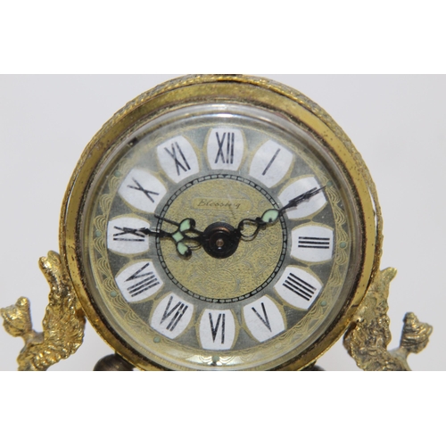 550 - ANTIQUE GILT BRONZE AND ONYX BOUDOIR CLOCK