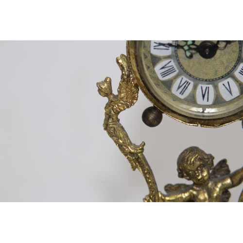550 - ANTIQUE GILT BRONZE AND ONYX BOUDOIR CLOCK