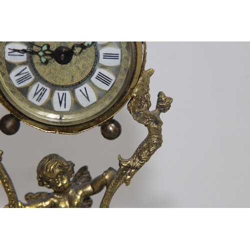 550 - ANTIQUE GILT BRONZE AND ONYX BOUDOIR CLOCK