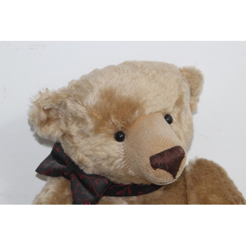 653 - GROWLER TEDDY BEAR
57CM
