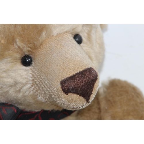 653 - GROWLER TEDDY BEAR
57CM