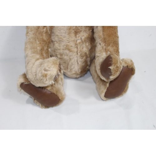 653 - GROWLER TEDDY BEAR
57CM