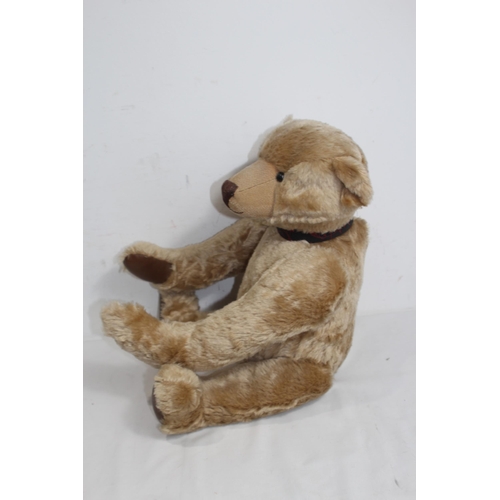 653 - GROWLER TEDDY BEAR
57CM