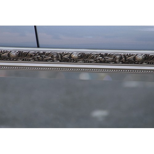 84 - ORNATE BEVELLED MIRROR
102 X 72CM