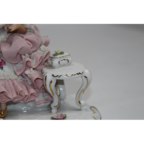 520 - DRESDEN FIGURINE OF A LADY LOOKING IN A MIRROR 
20CM